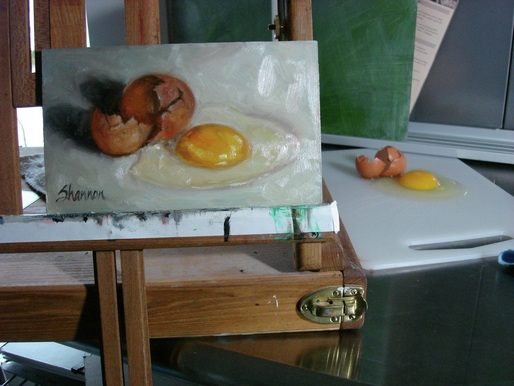 photo of egg still life set up and oil painting of egg still life